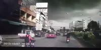 Palm branch knocks biker in Thailand