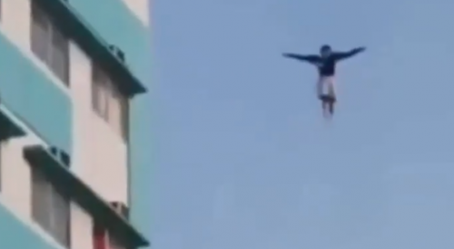 Suicidal Man Puts Show On For The Crowd