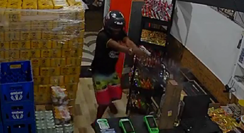 Store Owner Gets Into Gunfight With A Hitman
