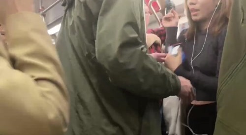 Based chink cums on woman's ass while standing on train (part 1)